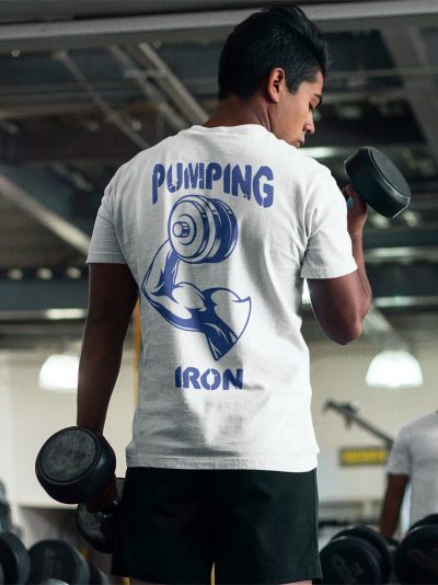 man wearing Pumping Iron T-shirt and lifting weights