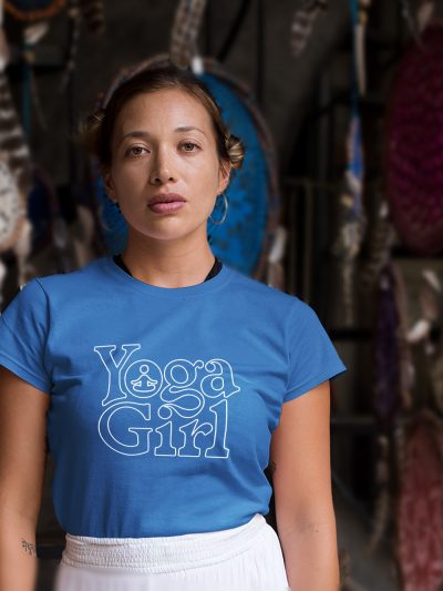 woman wearing Yoga Girl T-shirt and posing among dream catchers