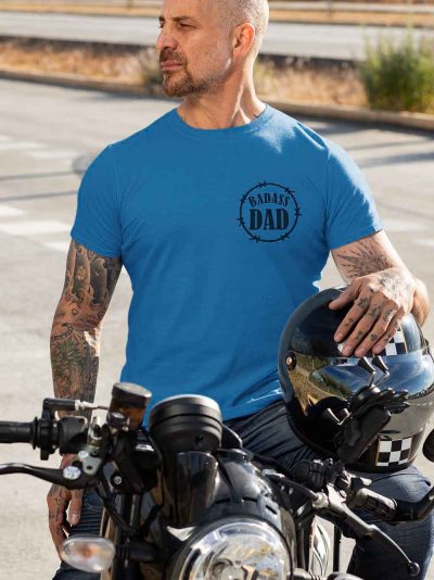 Man wearing Bad Ass Dad T-shirt sitting on a motorcycle